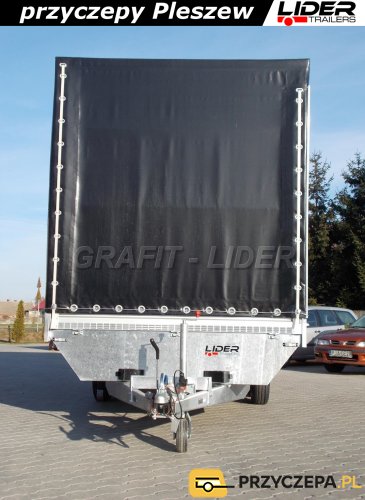 LT-023 przyczepa 520x220x220cm ciężarowa, wysokość rampowa, firana jednostronna, plandeka ze stelażem czarna, DMC 3500kg